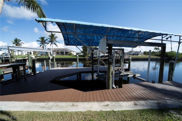 dock area with a water view