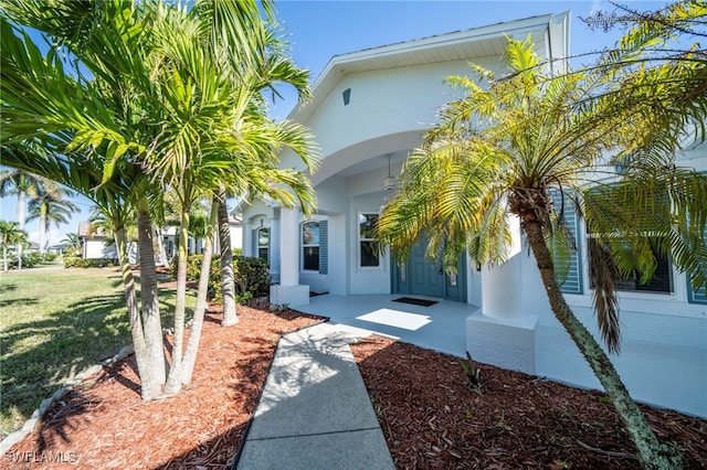 view of side of home featuring a yard