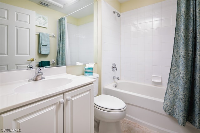 full bathroom featuring shower / bathtub combination with curtain, tile patterned flooring, vanity, and toilet