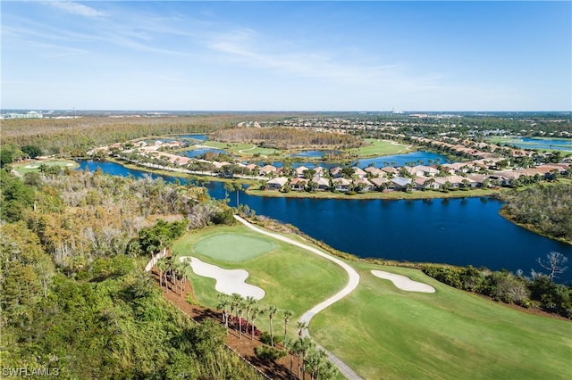 10038 Oakhurst Way, Fort Myers, FL 33913 - aerial perspective of suburban area featuring a golf course and a nearby body of water