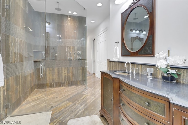 bathroom featuring vanity and walk in shower