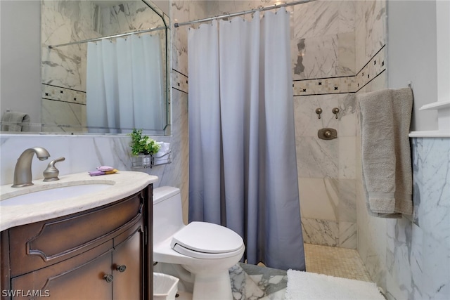 bathroom featuring vanity, curtained shower, and toilet