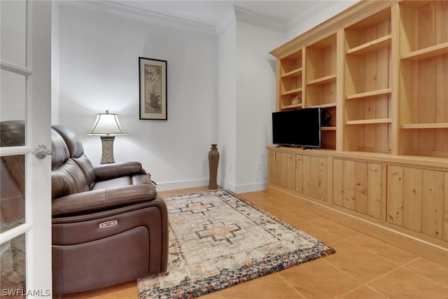 living room with tile patterned floors and ornamental molding