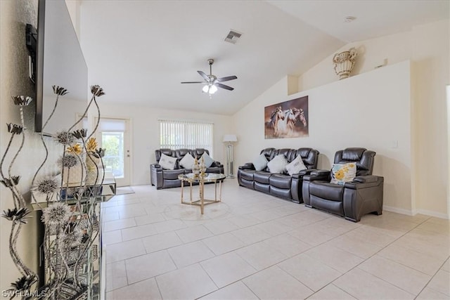 living room with ceiling fan, light tile patterned flooring, and vaulted ceiling