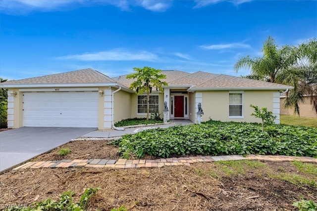 single story home featuring a garage