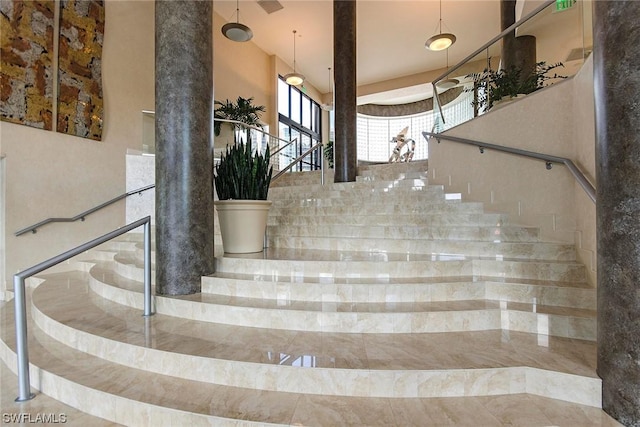 stairs with a towering ceiling