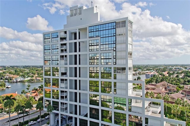 view of property with a water view