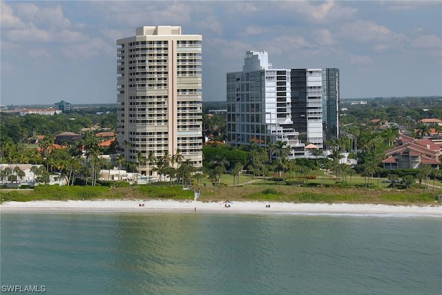 exterior space with a beach view and a water view