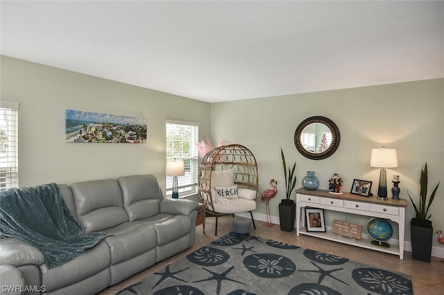 living room with tile patterned flooring