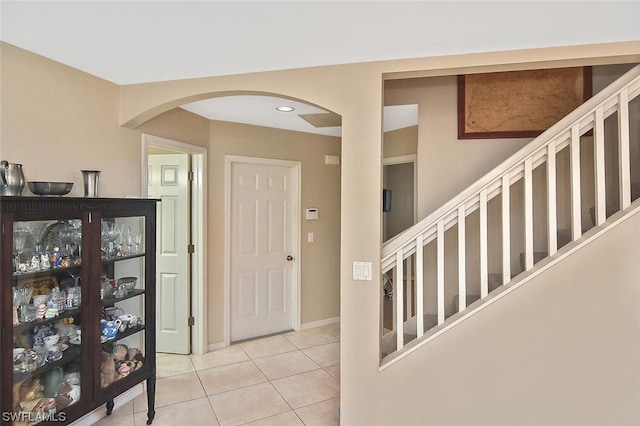 foyer entrance featuring light tile patterned floors