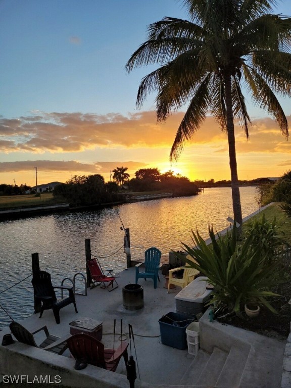 water view featuring an outdoor fire pit