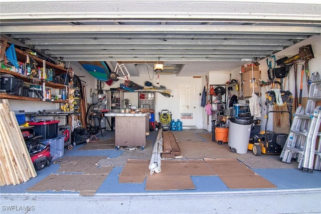 garage with a workshop area