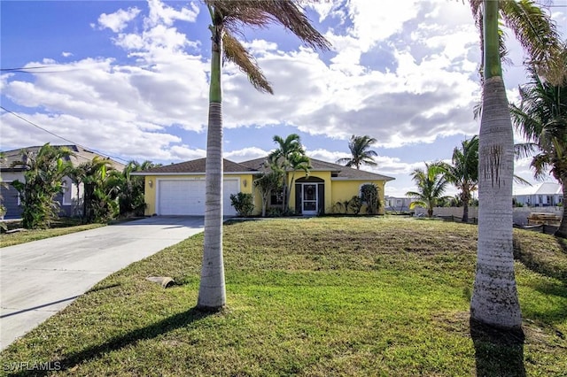 ranch-style home with a garage and a front lawn