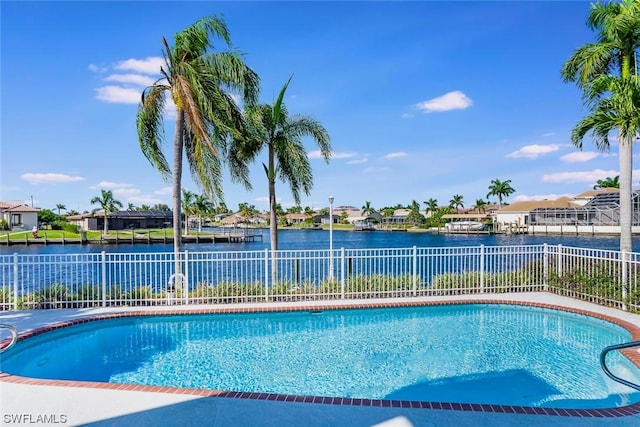 4630 SE 20th Ave, Cape Coral, FL 33904 - view of swimming pool with a water view