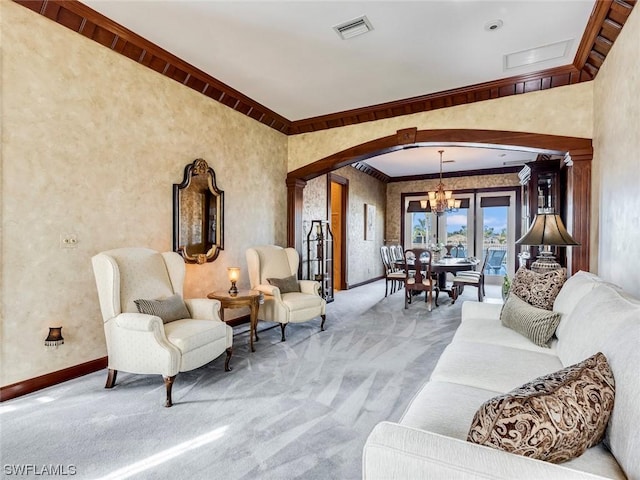 4630 SE 20th Ave, Cape Coral, FL 33904 - carpeted living room with an inviting chandelier and ornamental molding