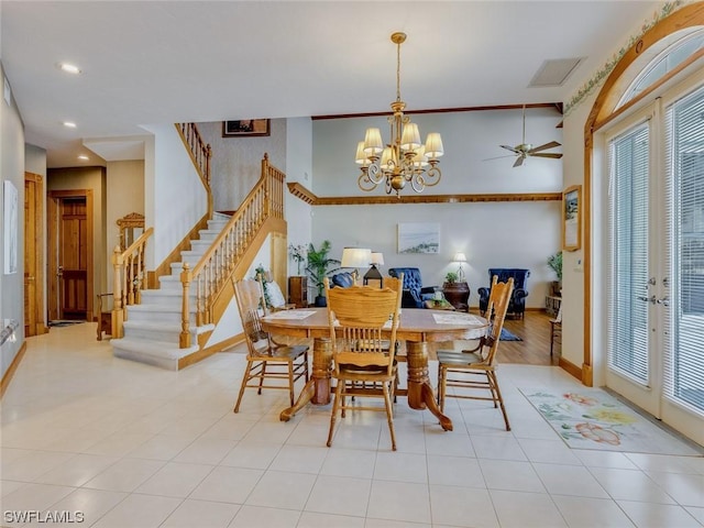 4630 SE 20th Ave, Cape Coral, FL 33904 - dining room featuring light tile patterned floors and a chandelier