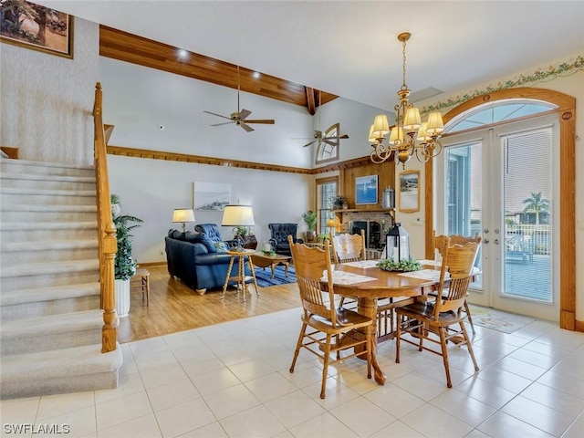 4630 SE 20th Ave, Cape Coral, FL 33904 - dining space featuring light tile patterned floors, plenty of natural light, and high vaulted ceiling