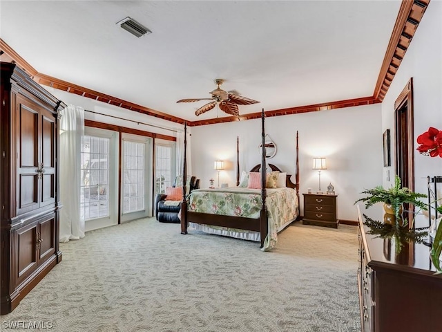 4630 SE 20th Ave, Cape Coral, FL 33904 - bedroom with crown molding and light colored carpet