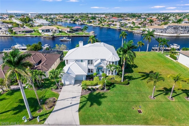 4630 SE 20th Ave, Cape Coral, FL 33904 - drone / aerial view with a water view