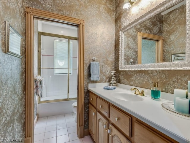 4630 SE 20th Ave, Cape Coral, FL 33904 - full bathroom with vanity, tile patterned flooring, shower / bath combination with glass door, and toilet