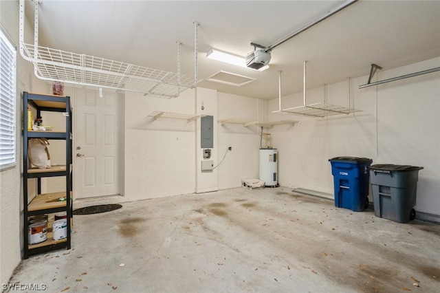 garage featuring electric water heater and a garage door opener