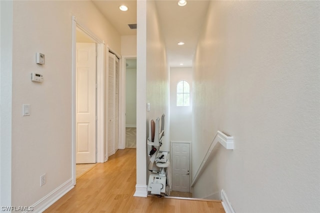 hallway featuring light hardwood / wood-style flooring