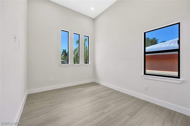 spare room featuring light hardwood / wood-style flooring