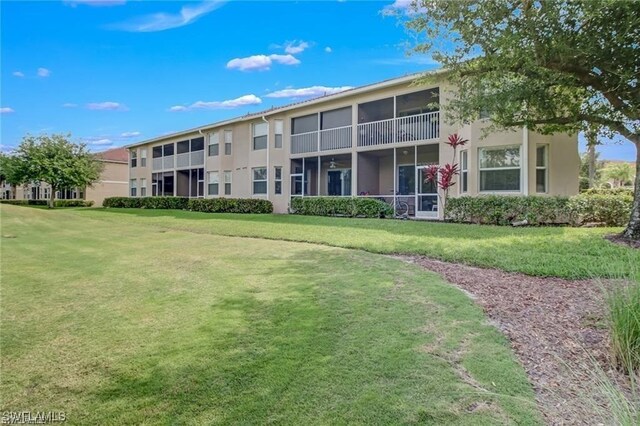 exterior space with a lawn