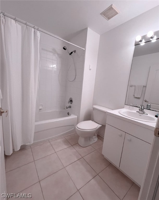 full bathroom with vanity, tile patterned flooring, toilet, and shower / tub combo with curtain