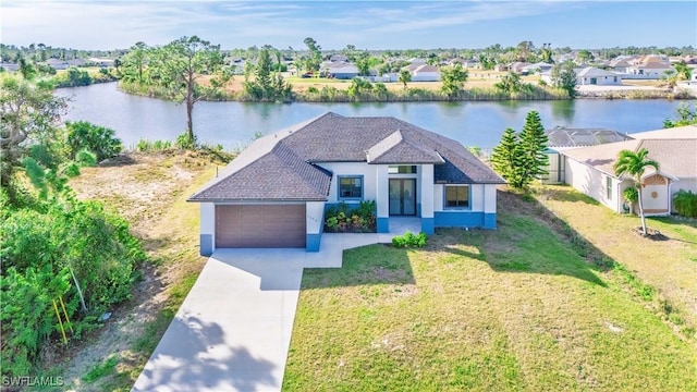 drone / aerial view with a water view