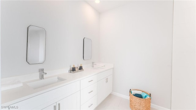 bathroom with vanity and tile patterned flooring