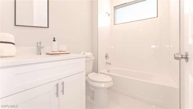 full bathroom featuring toilet, vanity, and tiled shower / bath combo