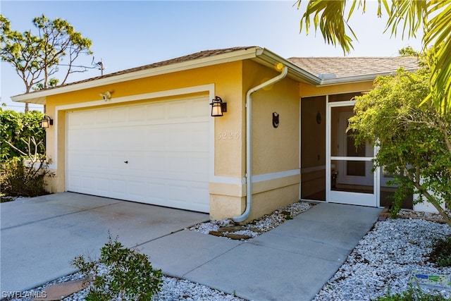 exterior space featuring a garage