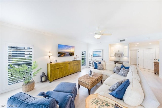 living room featuring ceiling fan