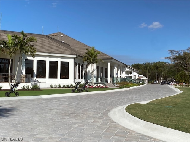 view of community featuring a lawn