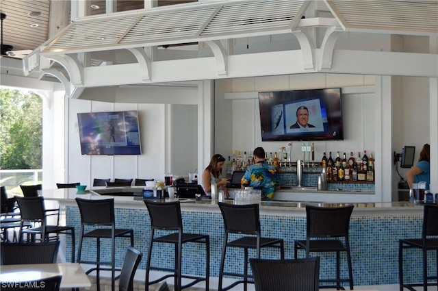 view of patio featuring a bar