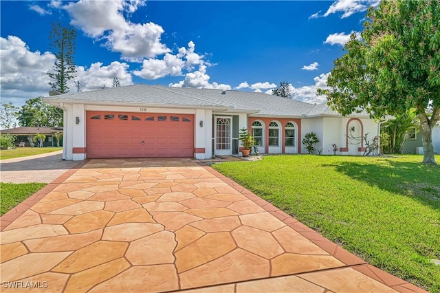 single story home featuring concrete driveway, an attached garage, a front lawn, and stucco siding