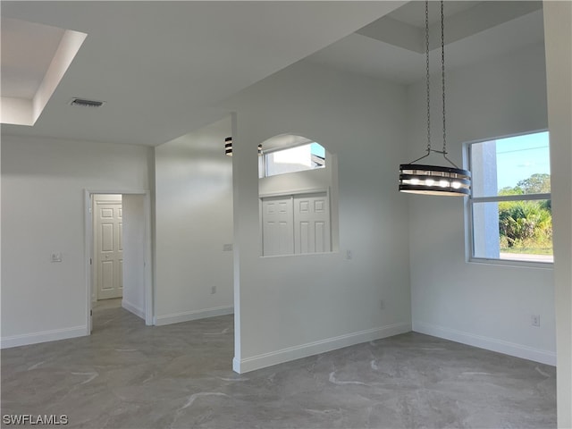 empty room with light tile floors