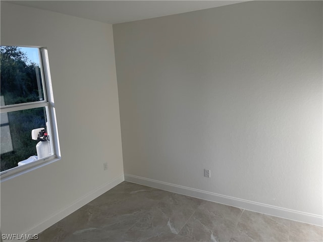 view of tiled spare room