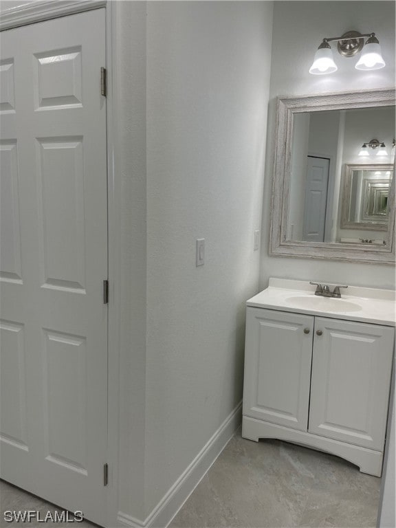 bathroom featuring tile floors and oversized vanity