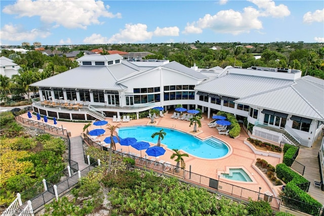 view of swimming pool featuring a patio