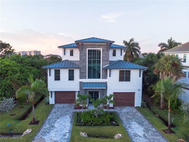 view of front of home with a garage