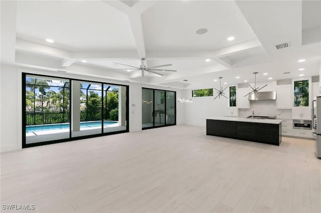 375 Periwinkle Ct, Marco Island, FL 34145 - unfurnished living room featuring coffered ceiling, visible vents, light wood-style flooring, and ceiling fan