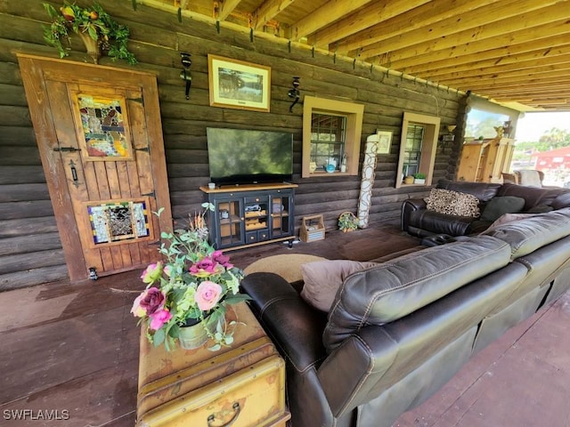 living room with log walls