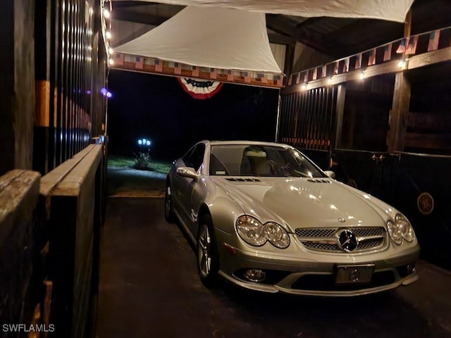 view of garage at night