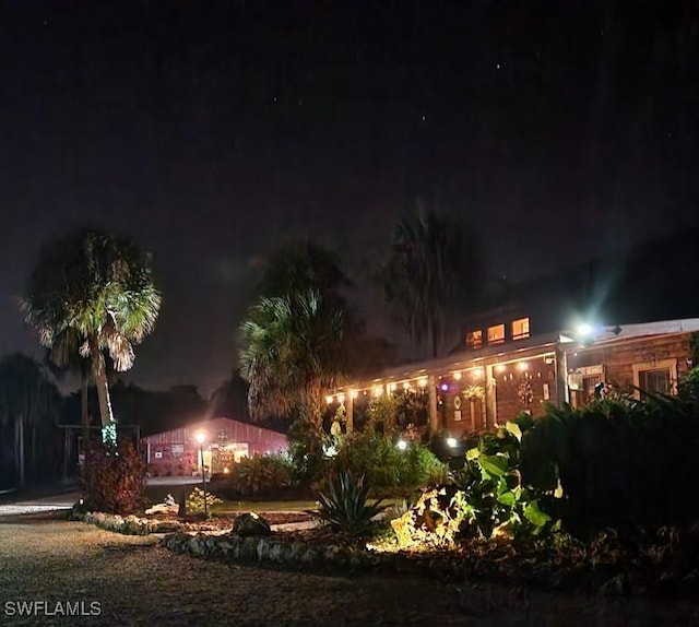 view of yard at night