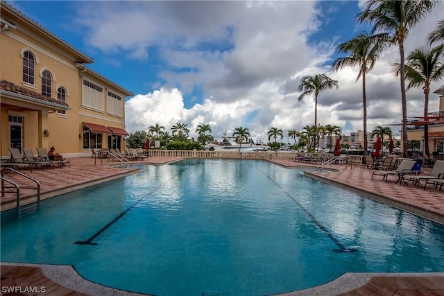 view of swimming pool featuring a patio area