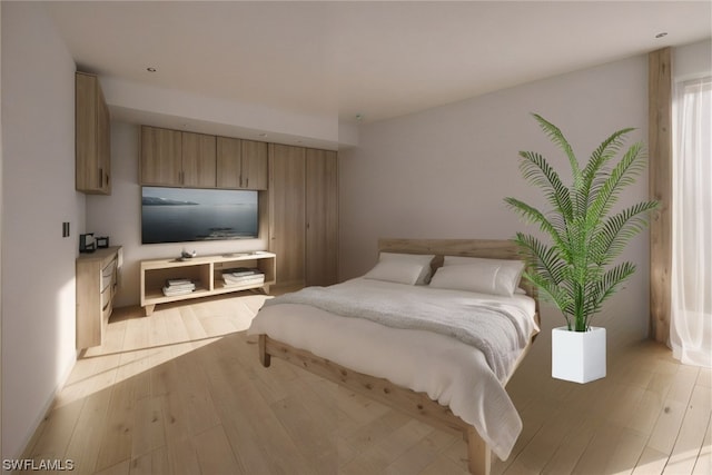 bedroom featuring light hardwood / wood-style floors