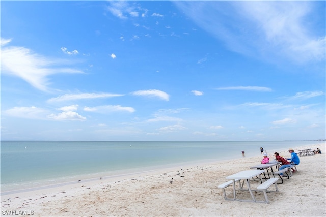 property view of water featuring a beach view