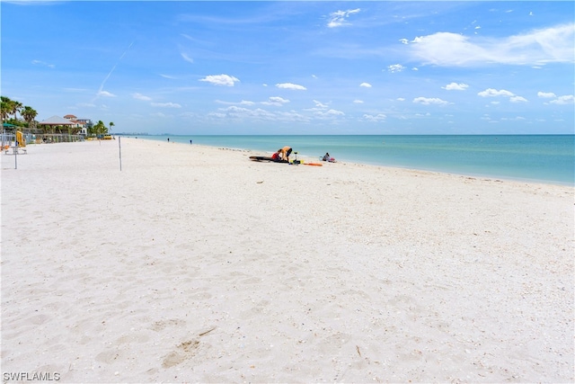 view of water feature with a beach view